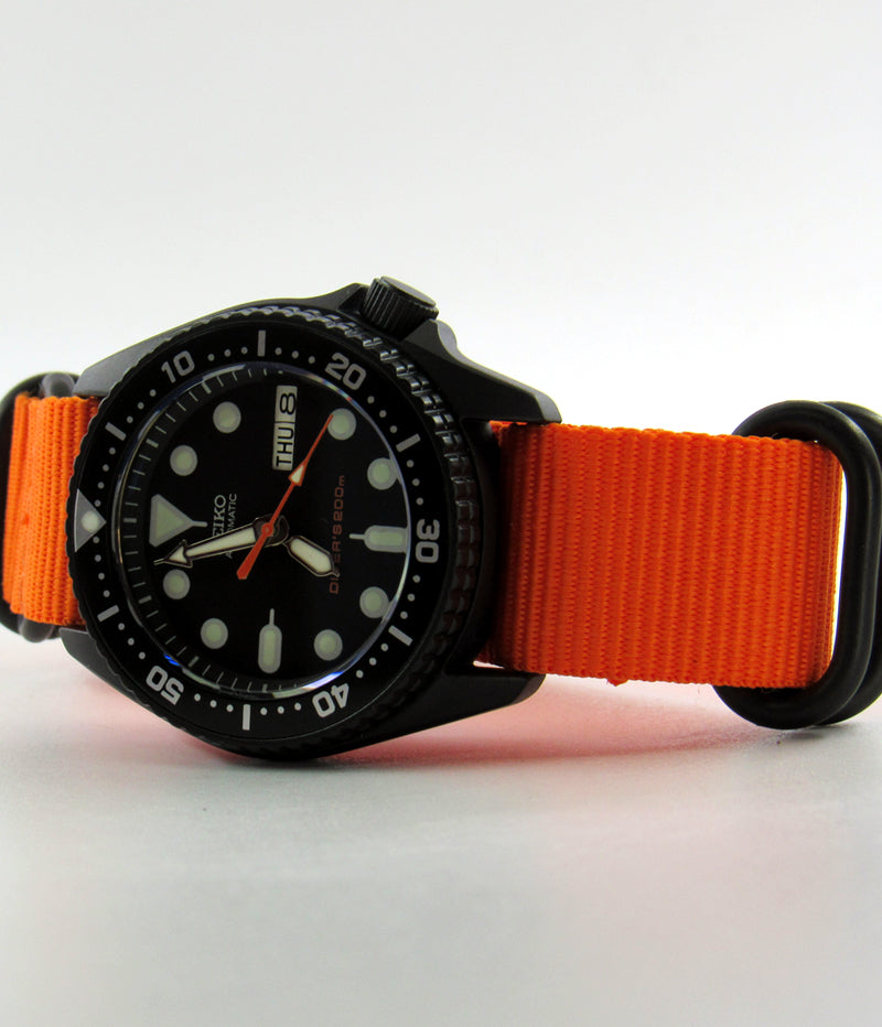 Vintage Seiko skx013 graphite black Cerakote ceramic coating with orange second hand