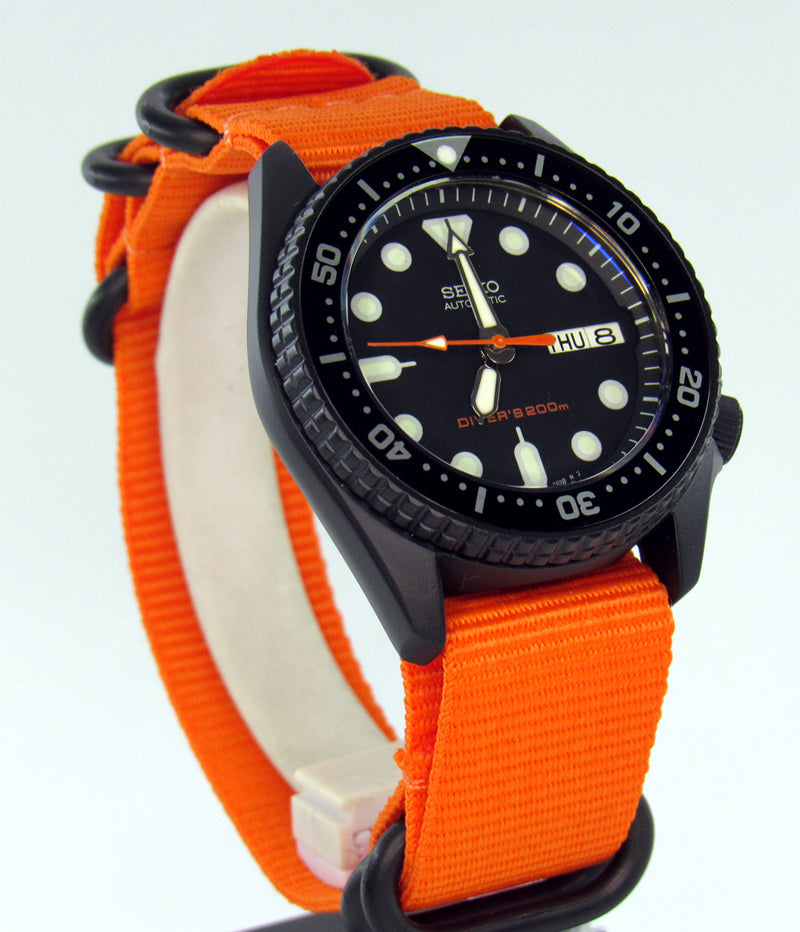 Vintage Seiko skx013 graphite black Cerakote ceramic coating with orange second hand