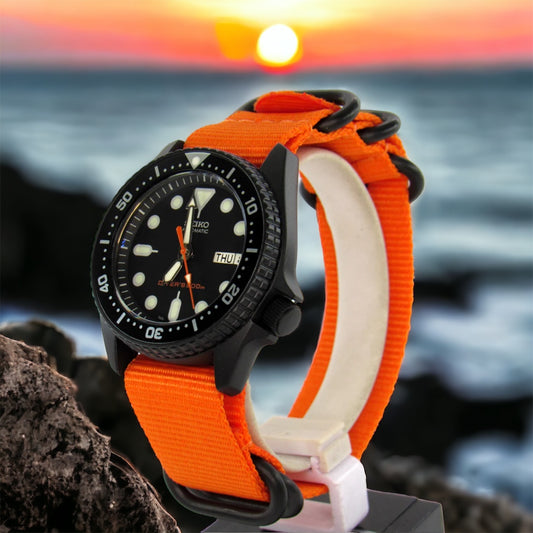 Vintage Seiko skx013 graphite black Cerakote ceramic coating with orange second hand